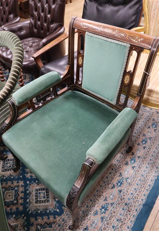 An Edwardian marquetry inlaid elbow chair